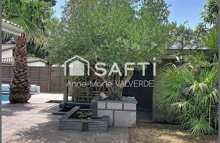 LACANAU VILLE 170 m²  PISCINE CHAUFFÉE  GARAGE  TERRAIN DE 941 m² — photo 5