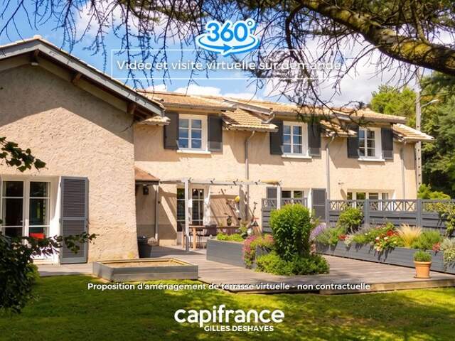 Maison 172 m² habitables, 187 m² au sol, sur un terrain arboré de 1 395 m² en Zone U — photo du bien