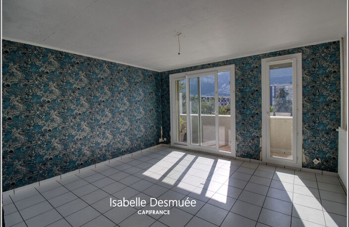 T4 traversant 78 m² – 3 chambres – Balcon – Vue dégagée sur les massifs – DPE C — photo 4