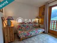 Studio cabine de 22 m2 avec balcon exposé sud et casier à ski offrant une vue dégagée sur les alpages et montagnes environnantes. — photo 2
