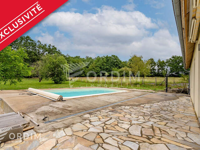 Maison plain-pied 102 m² avec piscine chauffée - terrain 2 083 m² — photo du bien