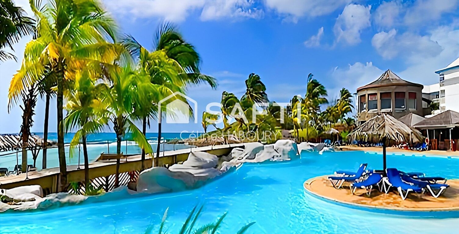 SUPERBE STUDIO EN REZ DE CHAUSSEE AVEC VUE SUR LA PISCINE ET VUE MER ROUTE TOURISTIQUE A SAINT FRANCOIS — photo 1