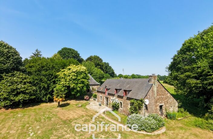 PROPRIÉTÉ DE CARACTÈRE SUR PLUS DE 9 HECTARES – MAISON EN PIERRE DE 235 M², APPARTEMENT INDÉPENDANT, DÉPENDANCE EN PIERRE, PRAIRIES, BOIS ET TROIS ÉTANGS – PROCHE LOUDÉAC — photo 2