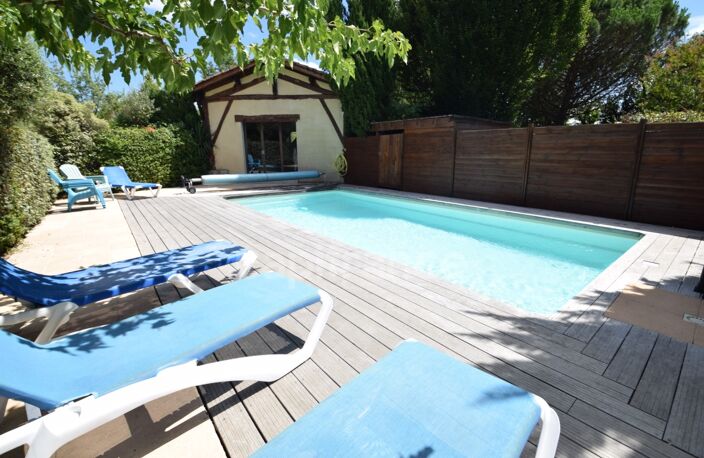 Propriété - une maison d'habitation - 5 chambres d'hôtes - 2 appartements en location sur plus de 1 hectare à SAINTE BAZEILLE (47) — photo 4