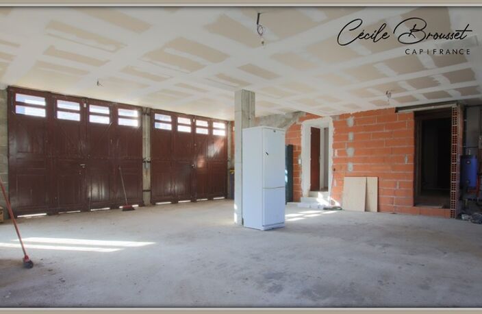 Villa 4 faces à vendre sur 1425 m2 de terrain avec garage et studio indépendant à REYNES (66) — photo 4