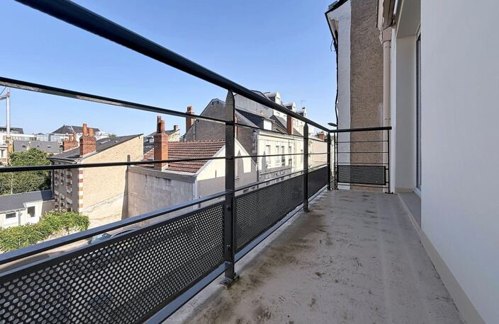 TYPE 3 74 M² ASCENSEUR + CAVE+ BALCON + PARKING — photo 2