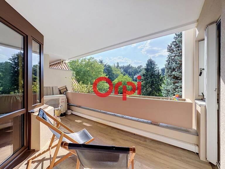 EXCLUSIVITÉ ORPI - OULLINS T4 CADRE VERDOYANT ET RÉNOVATION ÉNERGÉTIQUE COMPLÈTE — photo 1