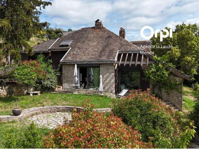 Maison d’architecte – volumes, pierre et paysage — photo du bien