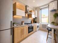 À Millau, à deux pas du centre-ville et des commerces, découvrez cet ensemble immobilier composé de deux appartements offrant un beau potentiel de rentabilité — photo 2
