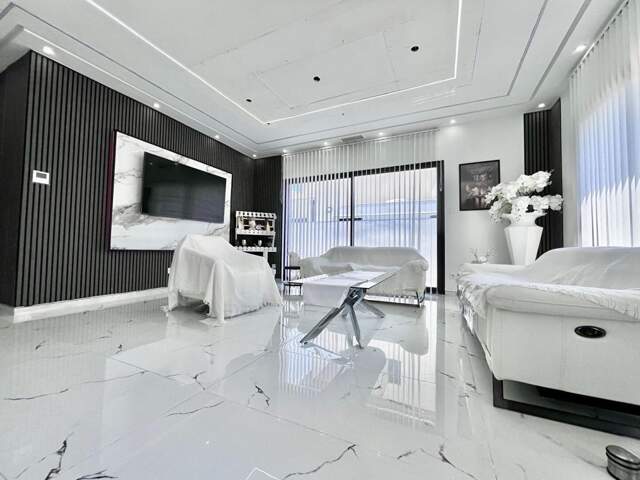Magnifique maison de plain-pied de 102 m²  de style contemporaine sur un terrain 3 faces de 299 m² — photo du bien