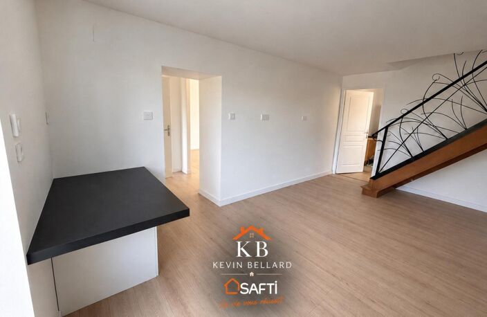 maison mitoyenne entièrement rénovée se composant de trois chambres dont une suite parentale ainsi qu'un grand séjour — photo 3