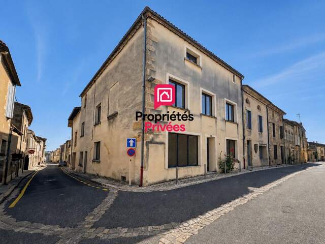 Immeuble en pierre avec garage, cour privative et fort potentiel d'aménagement — photo du bien
