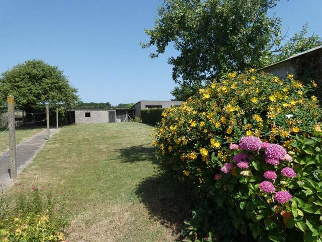 Maison de 119m2 avec 5 chambres, sur un magnifique terrain de1 794m2 : 3 garages, hangar, possibilité gîte ! — photo du bien