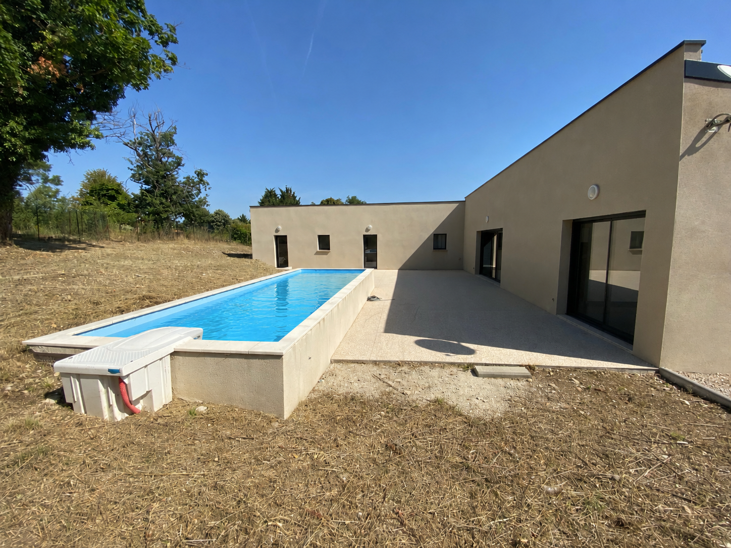 Maison contemporaine de plain pied 175m² avec piscine et studio - Saint Jean de Niost (01800)