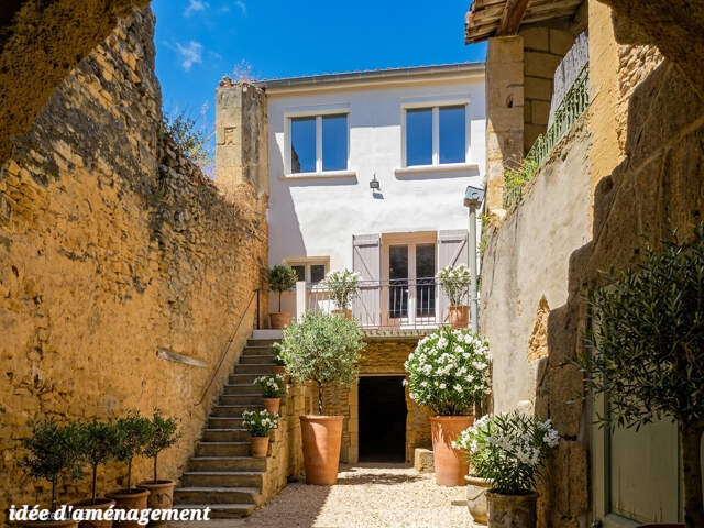 Dans un village prisé avec commerces! — photo du bien