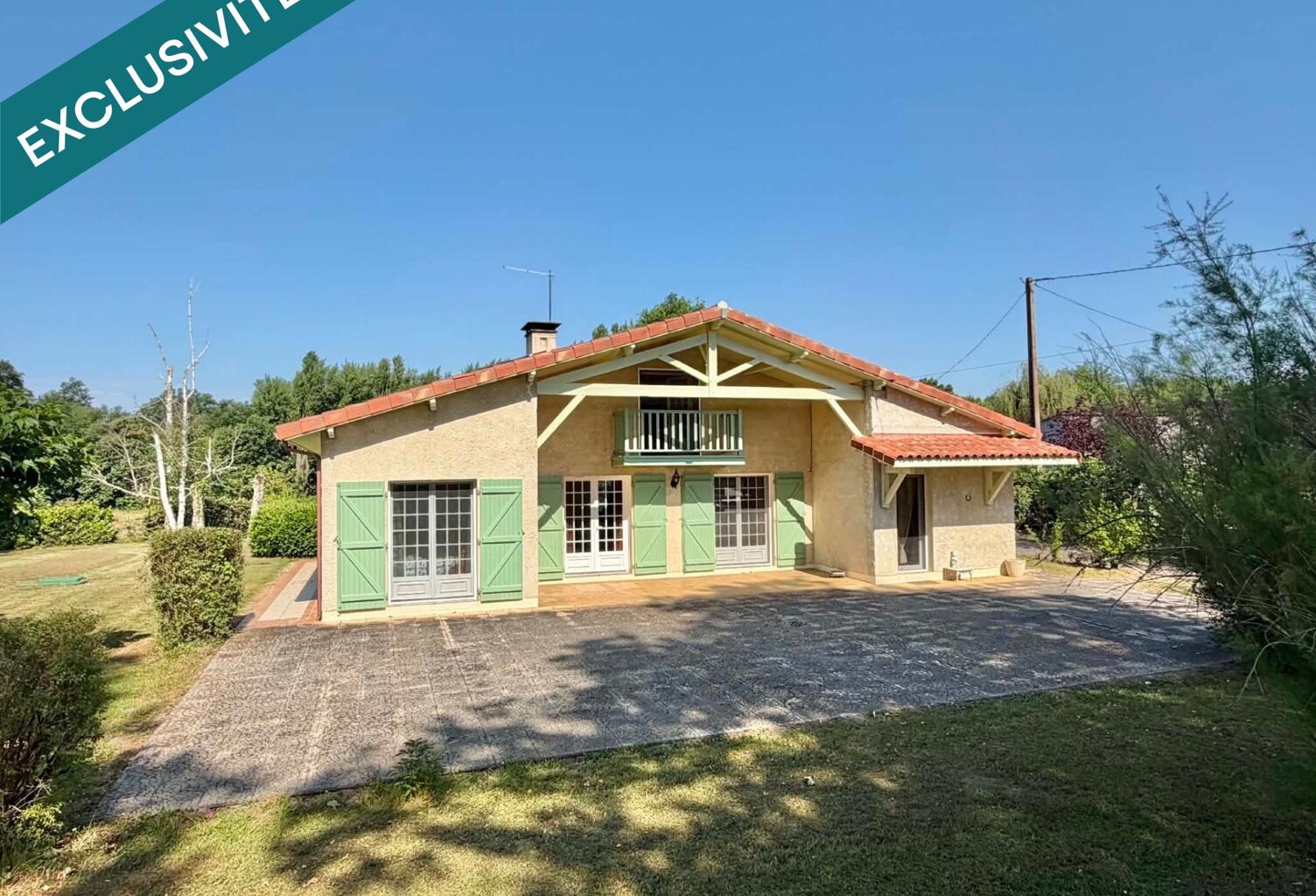 MAISON PLAIN PIED AVEC GRAND GARAGE  ET TERRAIN CLOS — photo 1