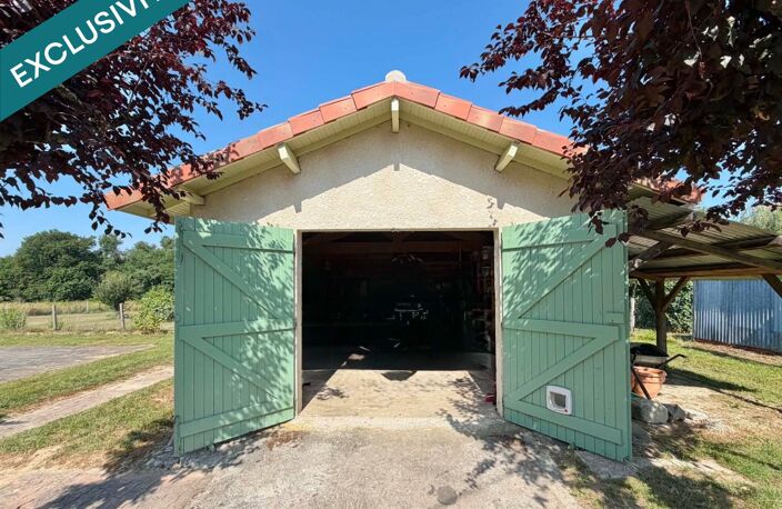 MAISON PLAIN PIED AVEC GRAND GARAGE  ET TERRAIN CLOS — photo 2