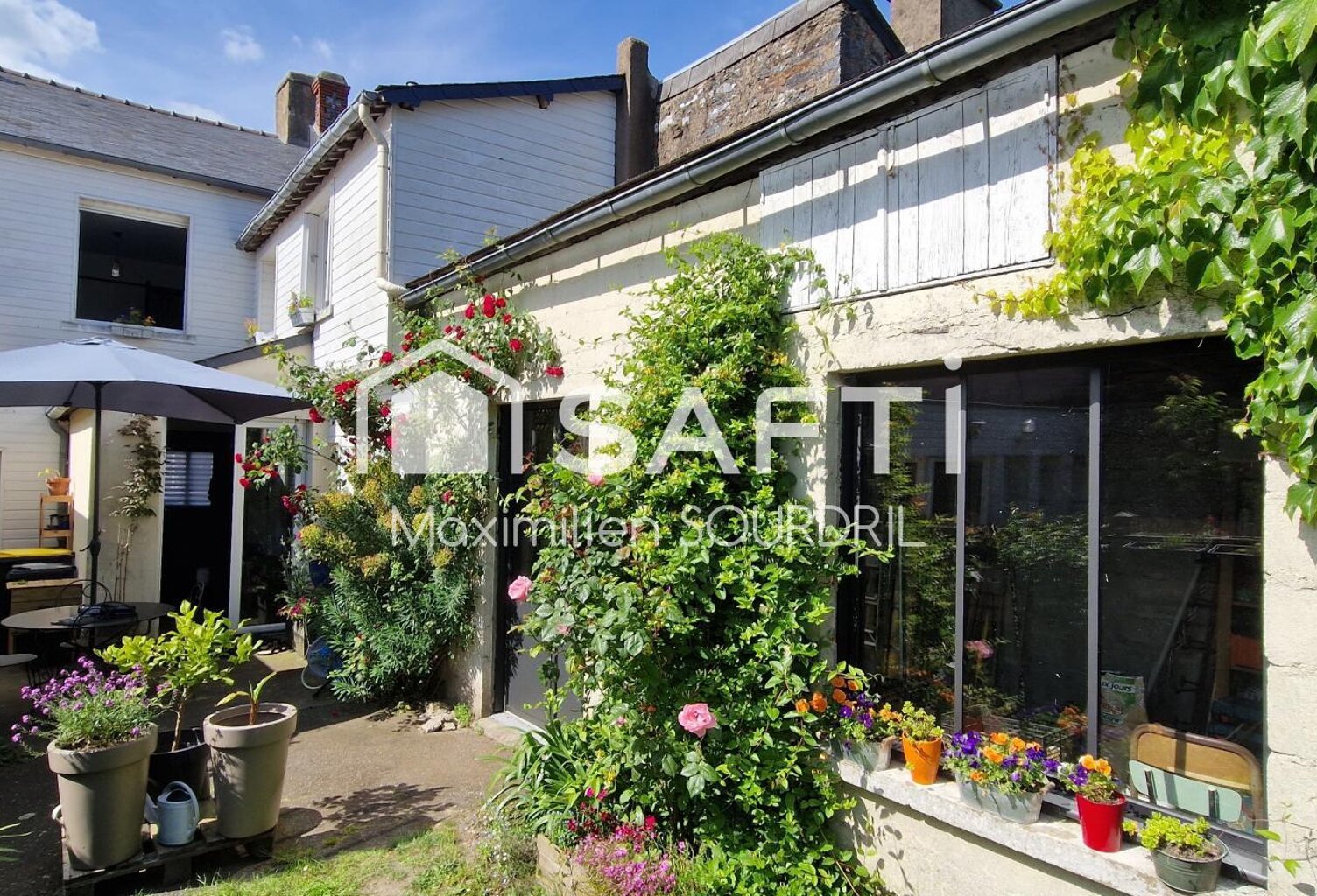 Maison centre-ville avec dépendance et jardin. — photo 1