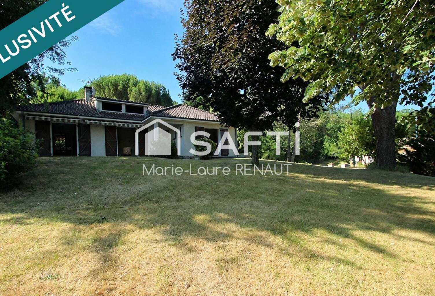 Maison familiale avec parc arboré et grand sous-sol — photo 1