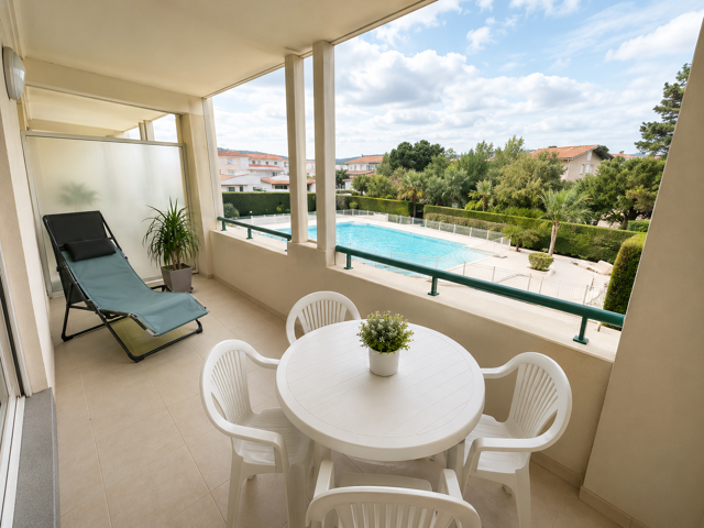T2 avec terrasse, piscine, parking proche des commerces — photo du bien