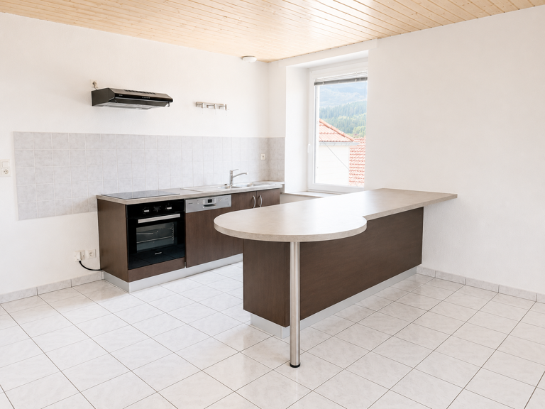 APPARTEMENT - CENTRE VILLE LE RUSSEY — photo 1