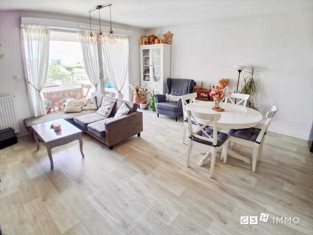Charmant T3 de 60m² avec terrasse et 2 places parking s/sol — photo du bien