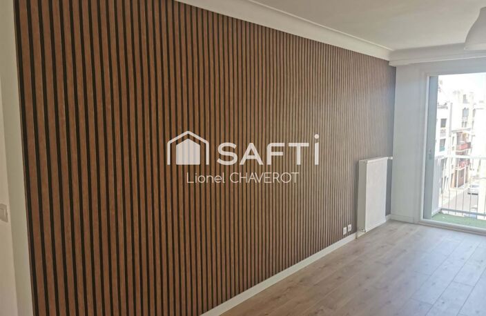 En plein cœur du centre-ville, découvrez cet appartement de 3 chambres avec garage. — photo 2