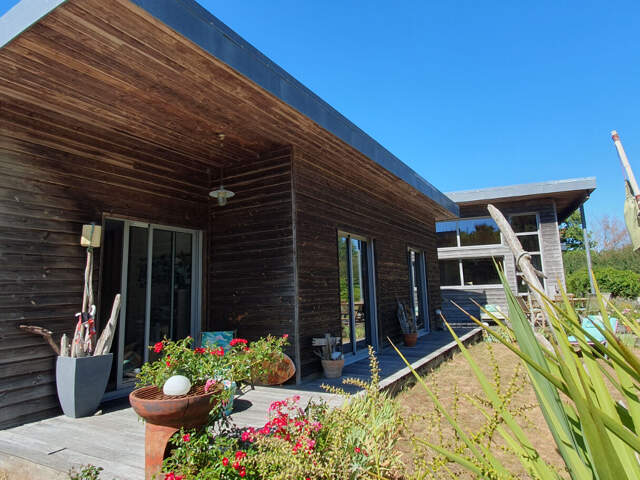 Maison d'architecte de plain-pied en ossature bois de 150 m² environ — photo du bien