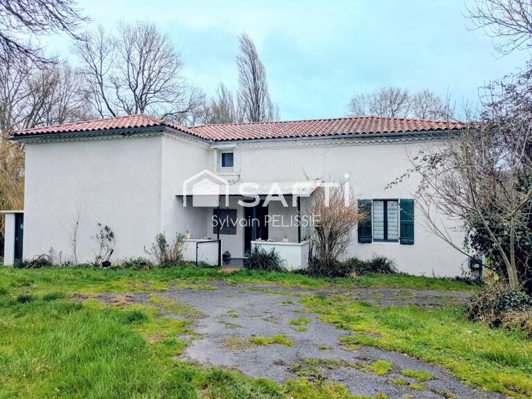 Ferme de caractère avec dépendances et beau potentiel — photo 1