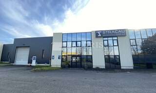Commerce  1858 m² à louer à Genas (69740)