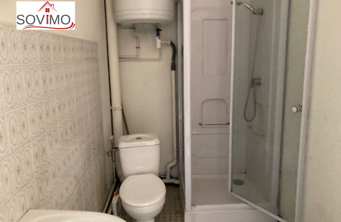 IMMEUBLE A INVESTISSEMENT LOCATIF : 2 APPTS + 1 LOCAL COMMER — photo 4