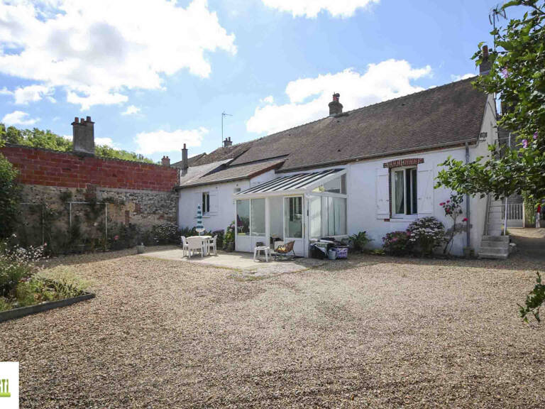 Maison de plain-pied avec garage et jardin — photo 1
