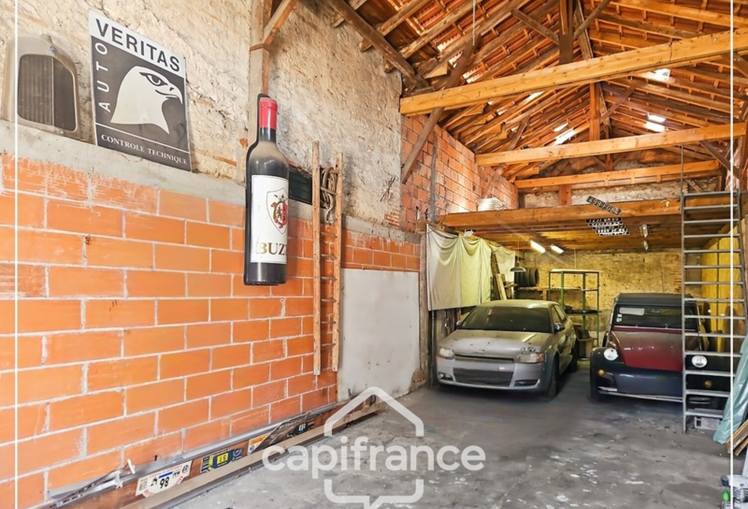 Garage de 70m² plus 28m² de mezzanine, tout à l'égout, eau et electricité, rare, centre ville Agen — photo 1