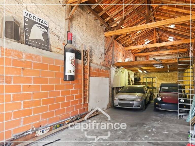 Garage de 70m² plus 28m² de mezzanine, tout à l'égout, eau et electricité, rare, centre ville Agen — photo 1