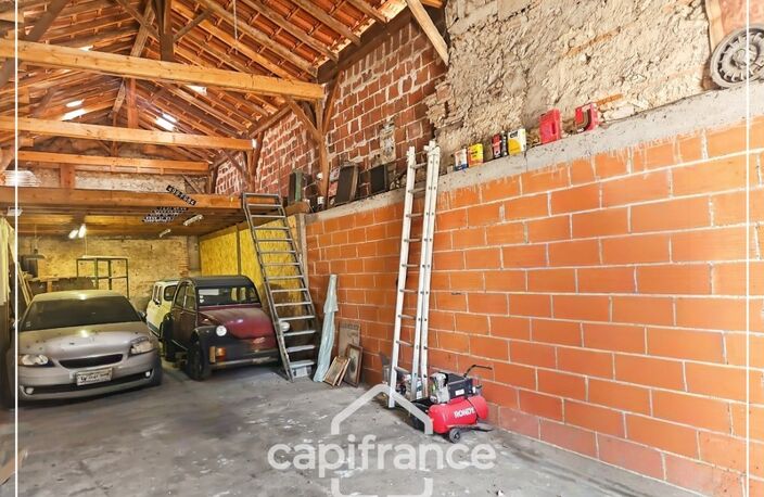 Garage de 70m² plus 28m² de mezzanine, tout à l'égout, eau et electricité, rare, centre ville Agen — photo 2