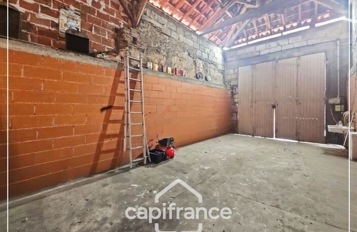 Garage de 70m² plus 28m² de mezzanine, tout à l'égout, eau et electricité, rare, centre ville Agen — photo 3
