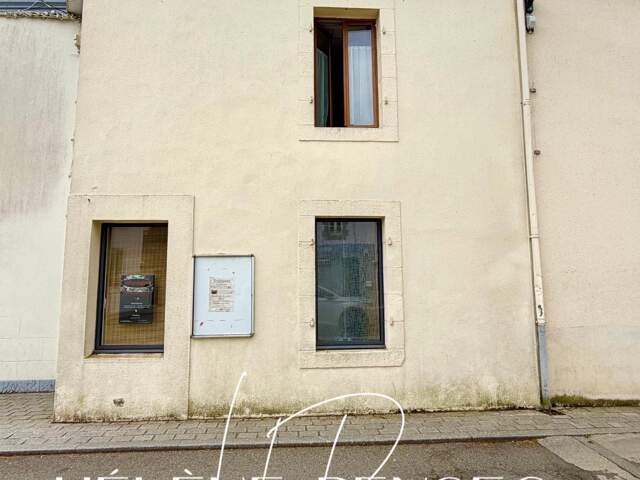Immeuble composé d'un local commercial et d'un appartement, en hypercentre. — photo du bien