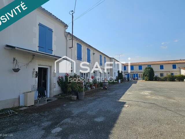 ensemble immobilier de plus de 400m² avec parking — photo du bien