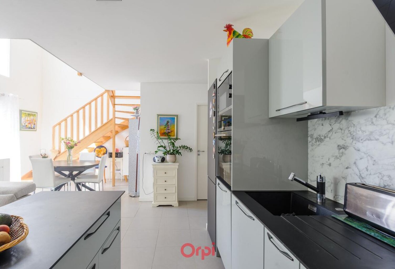 Exclusivité Orpi – Duplex 4 pièces avec ascenseur et deux places de parking — photo 1