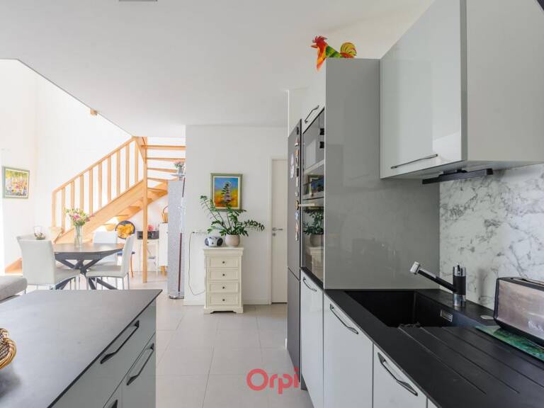 Exclusivité Orpi – Duplex 4 pièces avec ascenseur et deux places de parking — photo 1