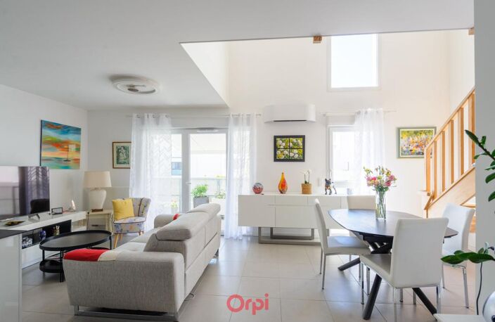 Exclusivité Orpi – Duplex 4 pièces avec ascenseur et deux places de parking — photo 2