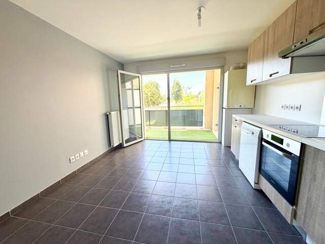 T2 de 50 m² avec terrasse, garage et parking dans une résidence récente — photo du bien