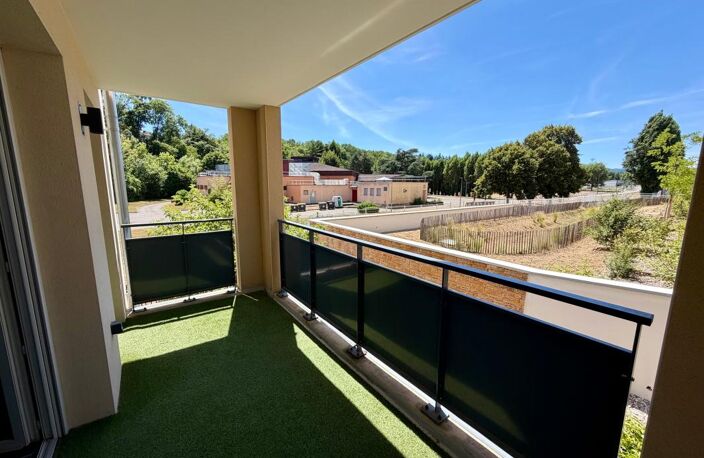 T2 de 50 m² avec terrasse, garage et parking dans une résidence récente — photo 2