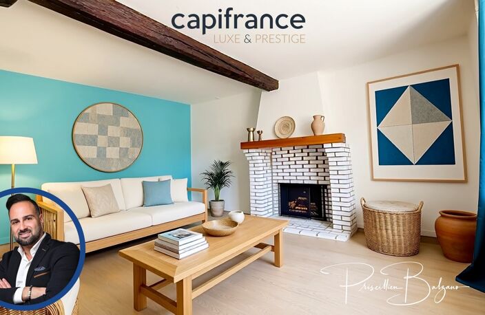 Maison à vendre 4 pièces SAINT GENIS LES OLLIERES (69) – Le charme d'une maison de village avec cour intimiste, garage et vie à pied ! — photo 2