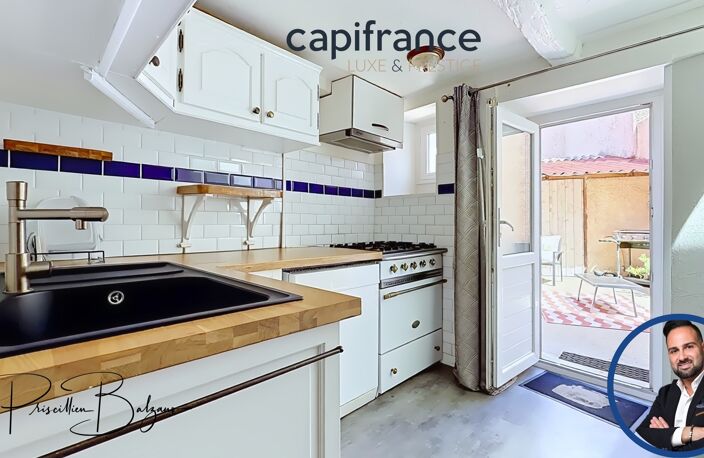 Maison à vendre 4 pièces SAINT GENIS LES OLLIERES (69) – Le charme d'une maison de village avec cour intimiste, garage et vie à pied ! — photo 5