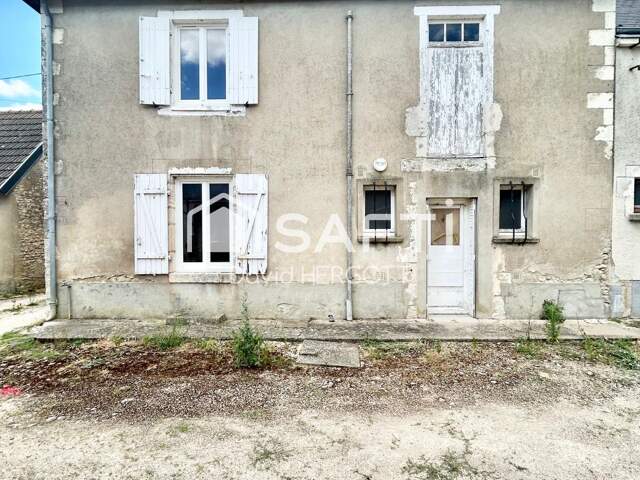 Maison ancienne à rénover avec dépendances et beau potentiel d'aménagement — photo du bien