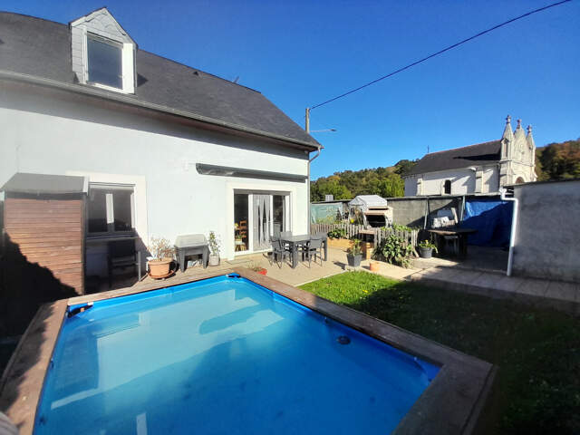 Maison élevée sur deux niveaux, 3 chambres et garage — photo du bien
