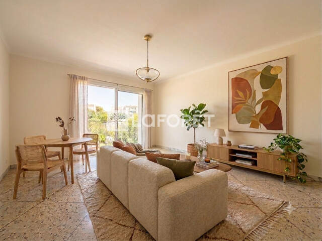 Studio 30 m² avec balcon, parking et cellier - Quartier Estanove — photo du bien
