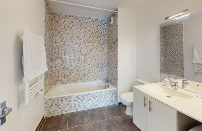 Vendu loué : T2 + parking, 6 240 €/an dès l'acte — photo 4