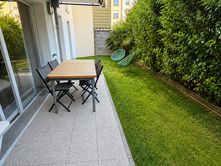 TINQUEUX Appartement T3 dans immeuble récent avec jardin et — photo 1